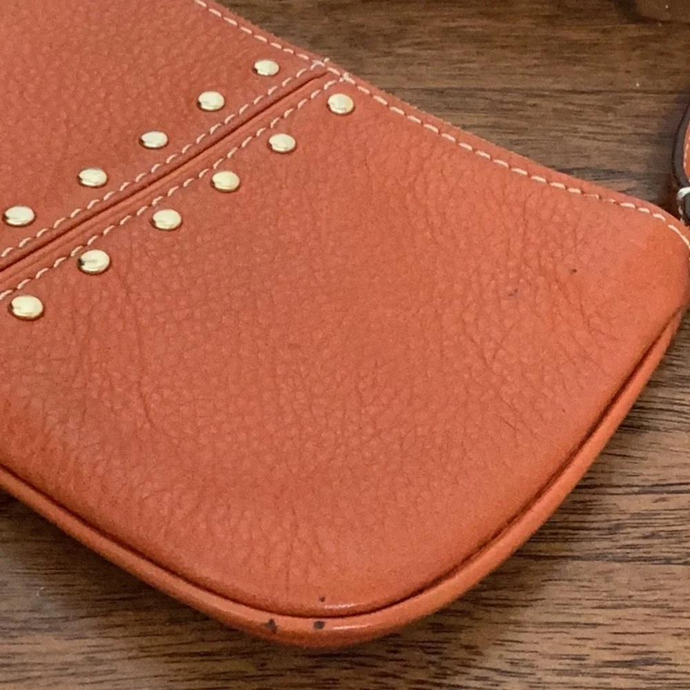 Michael Kors orange, gold tone Studded wristlet, clutch, zipper pouch